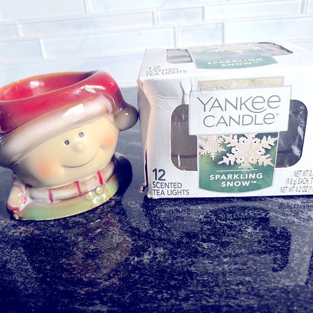 Yankee Candle tea light candles, with ceramic elf holder. Sparkling Snow scent